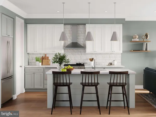 a kitchen with a table chairs sink and cabinets