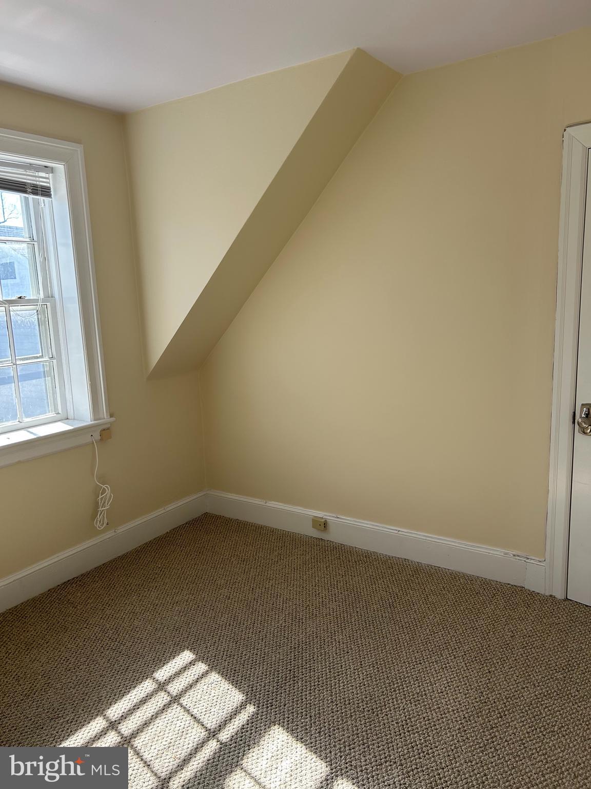 265 Moore Street, Unit 2 Princeton, NJ 08540 - Photo 4 of 7 an empty room with a window