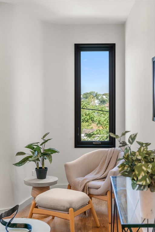 191 Condor Street, Unit 6 Boston, MA 02128 - Photo 6 of 14 a living room with furniture and a window