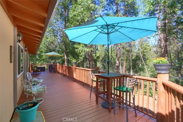 swimming pool view with a seating space