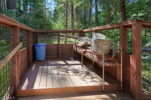 a view of deck with wooden floor and seating space