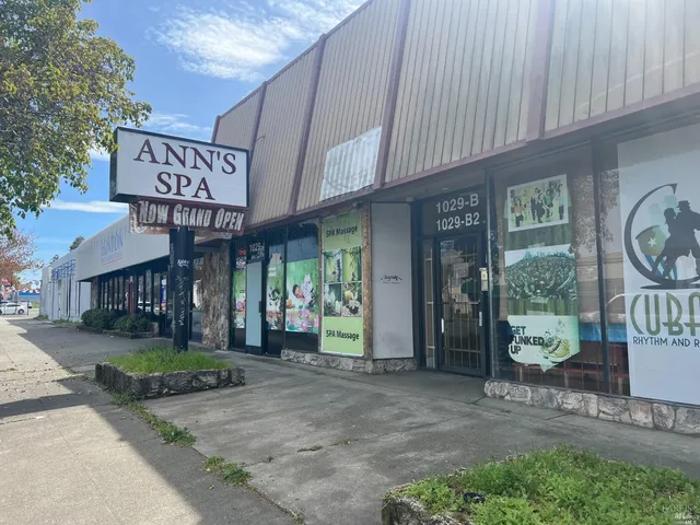 a view of a street with sitting area