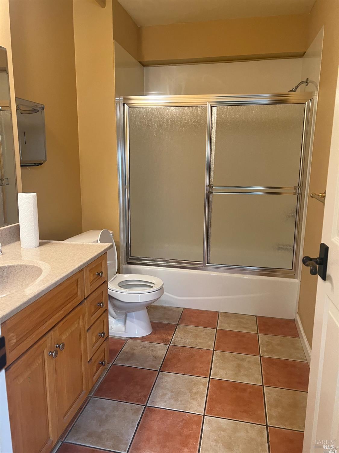 1029 Tennessee Street Vallejo, CA 94590 - Photo 4 of 19 a bathroom with a sink toilet and shower