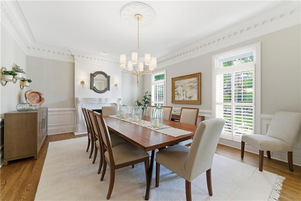 2918 Major Ridge Trail Duluth, GA 30097 - Photo 11 of 70 a view of a dining room with furniture window and wooden floor