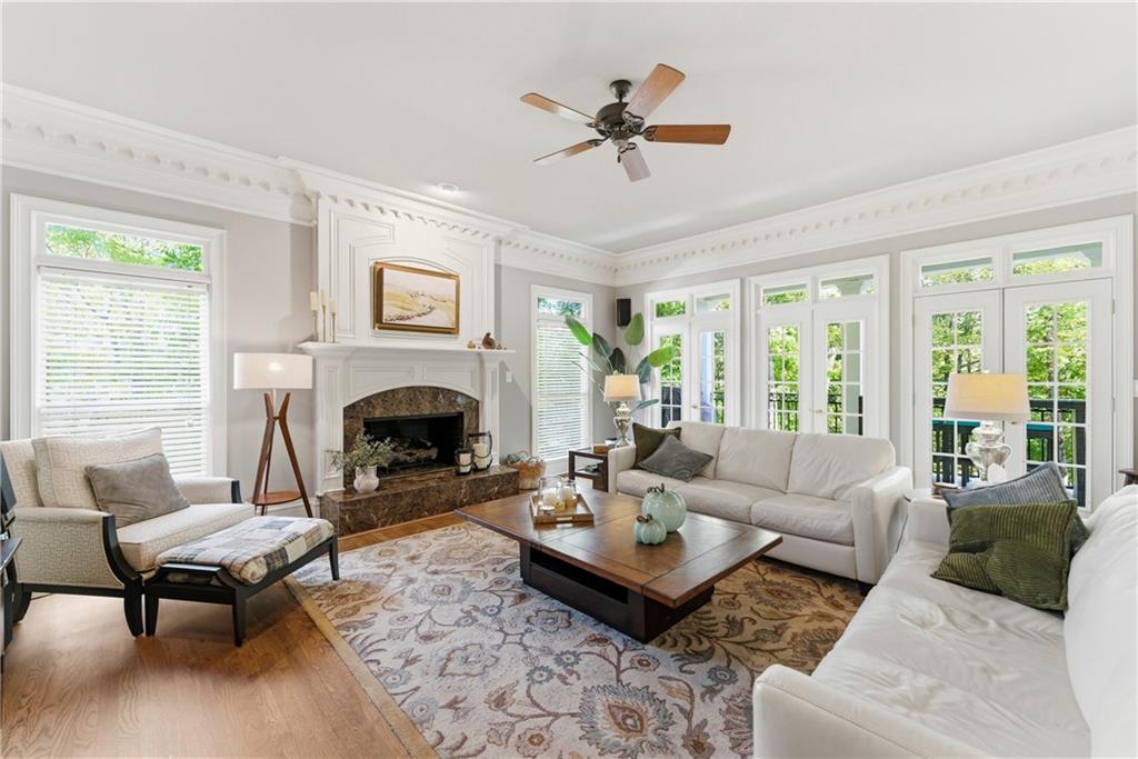 2918 Major Ridge Trail Duluth, GA 30097 - Photo 15 of 70 a living room with furniture fireplace and a large window
