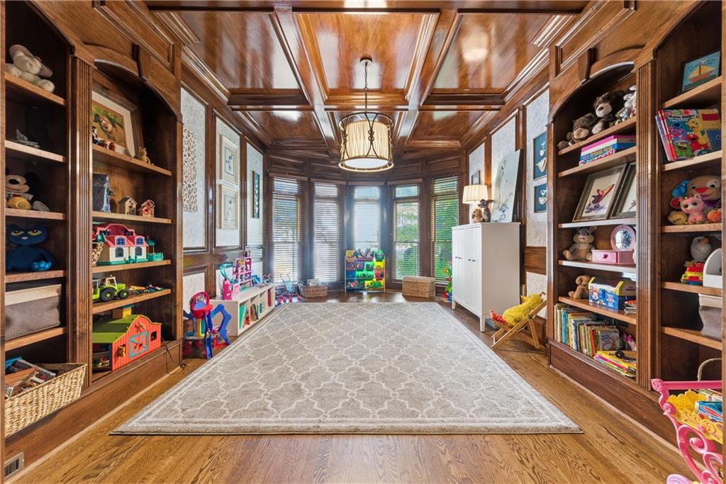 2918 Major Ridge Trail Duluth, GA 30097 - Photo 16 of 70 a view of living room with furniture and book shelf