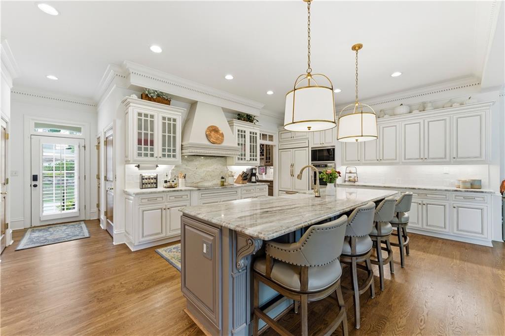 2918 Major Ridge Trail Duluth, GA 30097 - Photo 19 of 70 a large kitchen with granite countertop lots of counter space and window