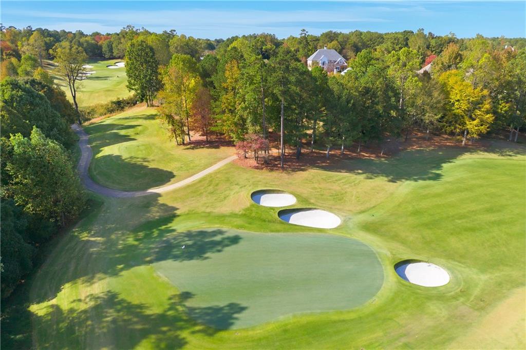 2918 Major Ridge Trail Duluth, GA 30097 - Photo 2 of 70 a view of a swimming pool with a yard