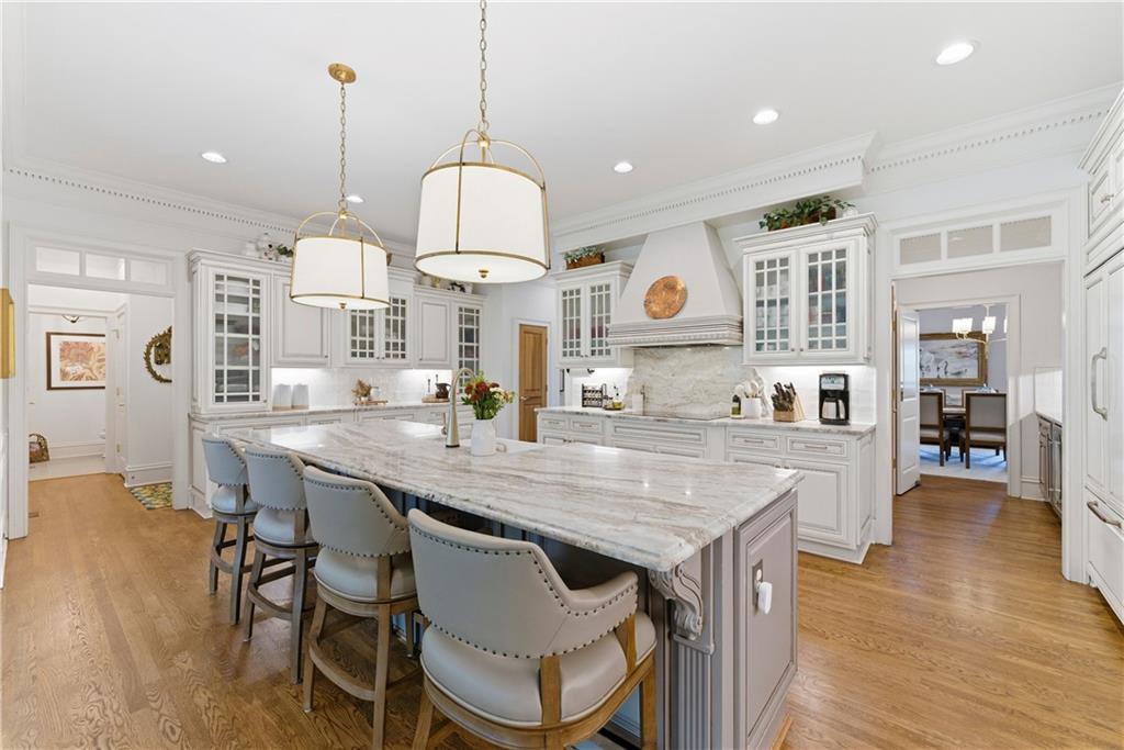 2918 Major Ridge Trail Duluth, GA 30097 - Photo 24 of 70 a kitchen with a table and chairs in it
