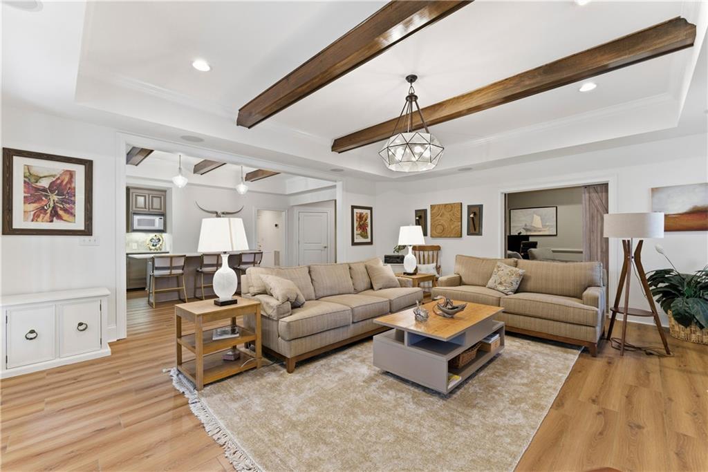 2918 Major Ridge Trail Duluth, GA 30097 - Photo 28 of 70 a living room with furniture or couch and a wooden floor