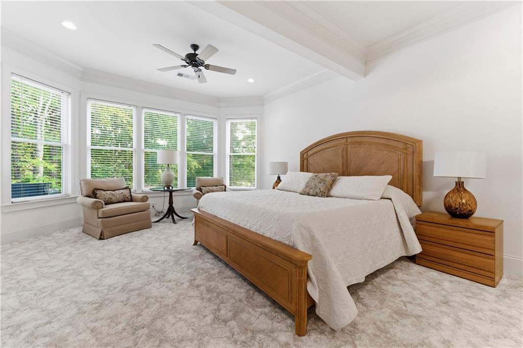 2918 Major Ridge Trail Duluth, GA 30097 - Photo 29 of 70 a bedroom with a bed and a large window