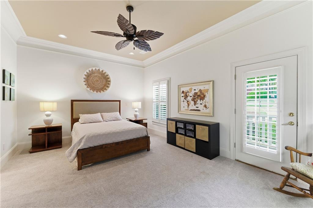 2918 Major Ridge Trail Duluth, GA 30097 - Photo 35 of 70 a bedroom with a bed and a chandelier