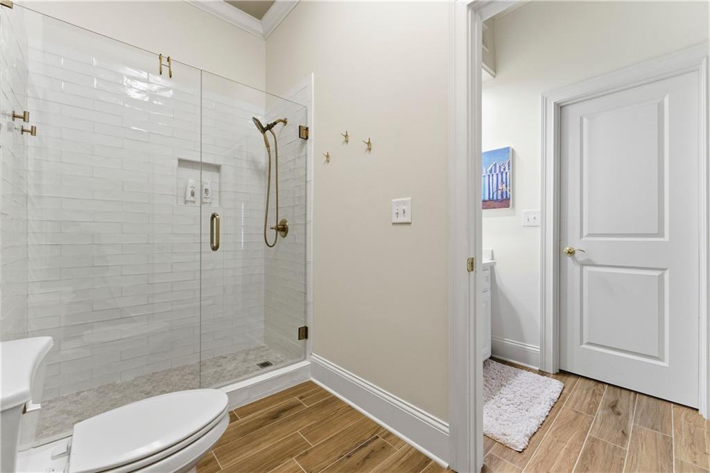 2918 Major Ridge Trail Duluth, GA 30097 - Photo 36 of 70 a bathroom with a shower and toilet