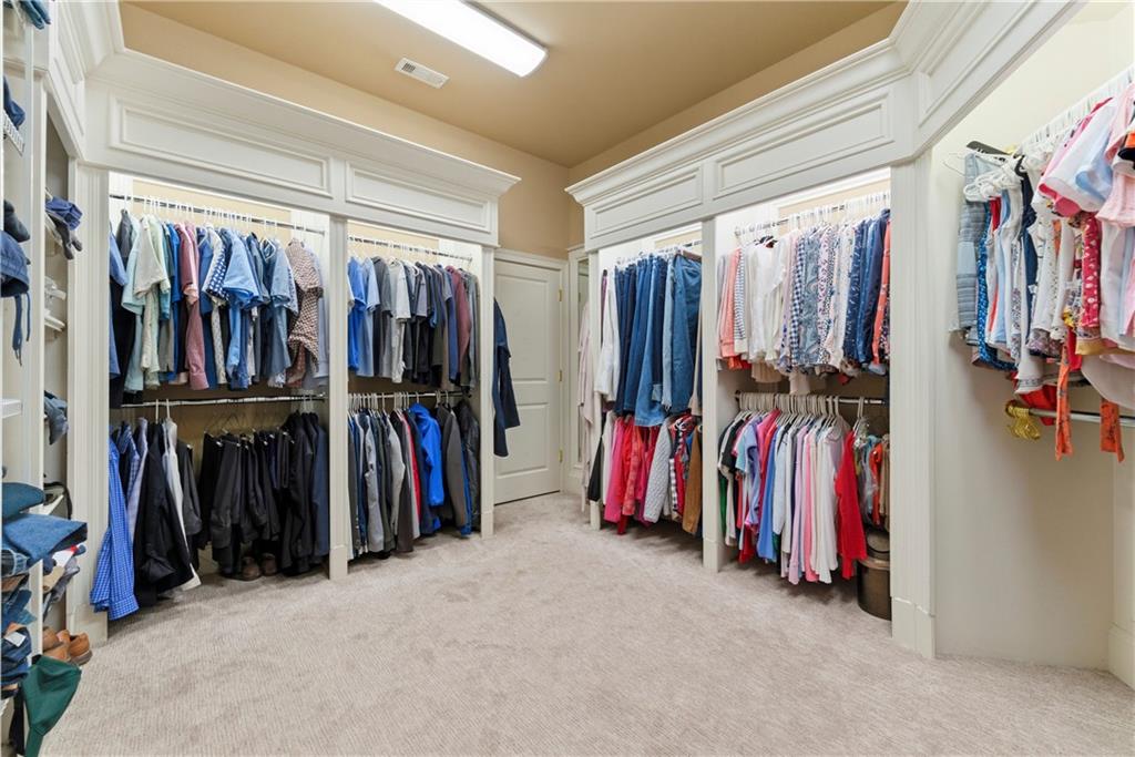 2918 Major Ridge Trail Duluth, GA 30097 - Photo 41 of 70 a view of walk in closet with clothes
