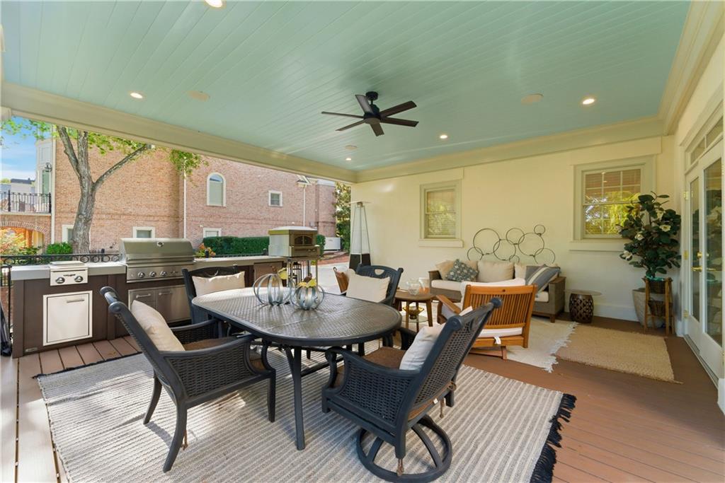 2918 Major Ridge Trail Duluth, GA 30097 - Photo 46 of 70 a view of a dining room with furniture window and wooden floor
