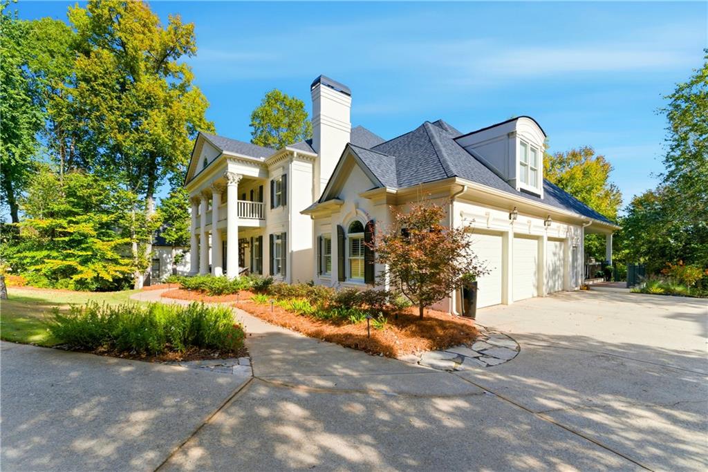 2918 Major Ridge Trail Duluth, GA 30097 - Photo 5 of 70 a front view of a house with a yard