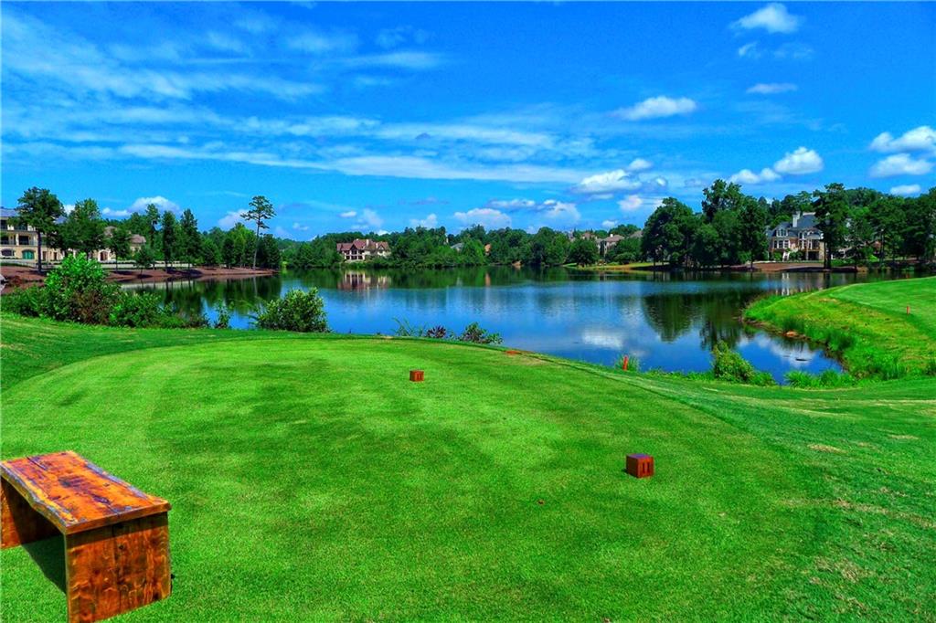 2918 Major Ridge Trail Duluth, GA 30097 - Photo 68 of 70 a view of a lake with a big yard