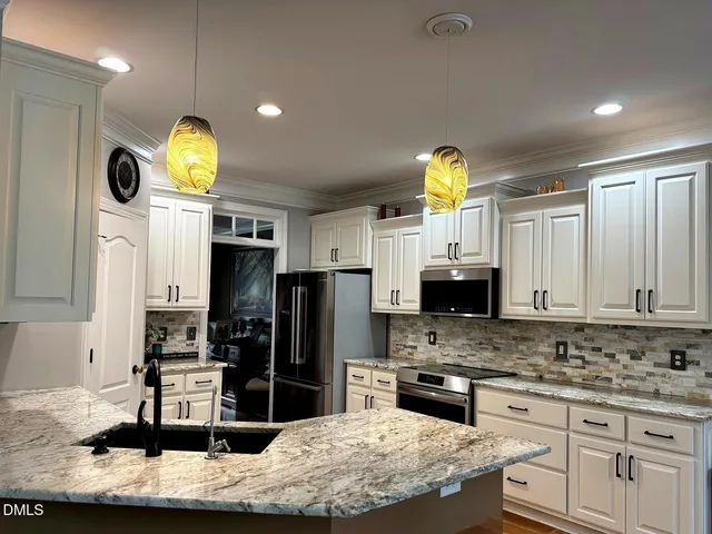 $650,000 | 1224 Turner Woods Drive, Raleigh, NC 27603