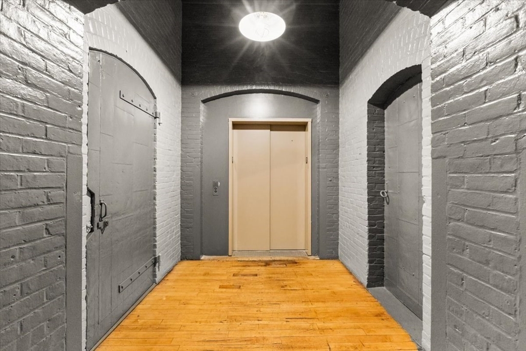 685 Social Street, Unit 215 Woonsocket, RI 02895 - Photo 15 of 40 a bathroom with a tub and shower