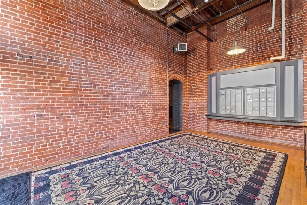 685 Social Street, Unit 215 Woonsocket, RI 02895 - Photo 20 of 40 a view of an empty room