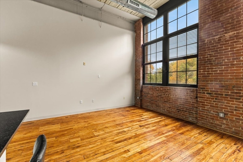 685 Social Street, Unit 215 Woonsocket, RI 02895 - Photo 24 of 40 a view of an empty room
