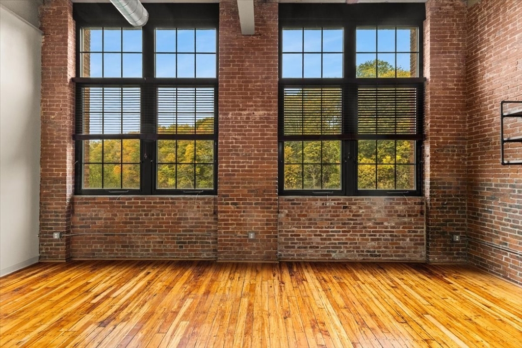 685 Social Street, Unit 215 Woonsocket, RI 02895 - Photo 25 of 40 a view of front door of house and window