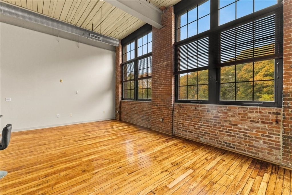 685 Social Street, Unit 215 Woonsocket, RI 02895 - Photo 26 of 40 a view of an empty room