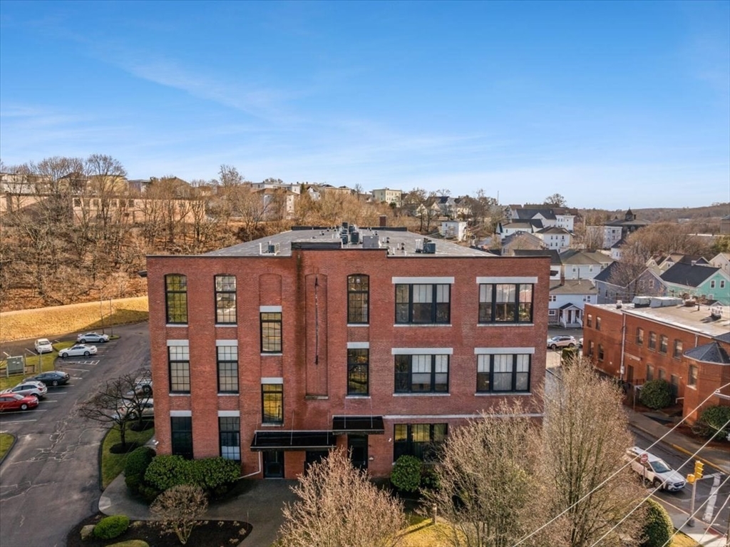 685 Social Street, Unit 215 Woonsocket, RI 02895 - Photo 8 of 40 a view of a large building