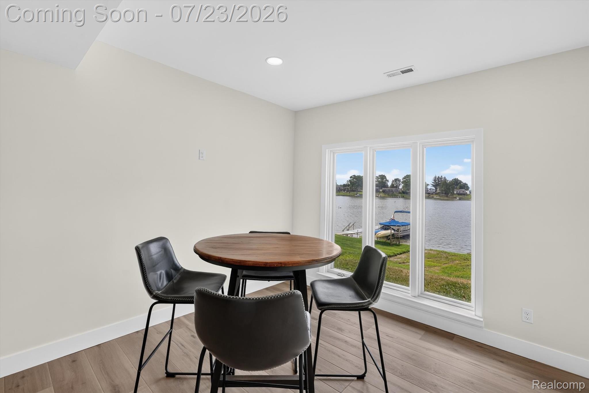 3429 Rolston Road Fenton, MI 48430 - Photo 34 of 62 Waterfront setting with a triple window for expansive outdoor light