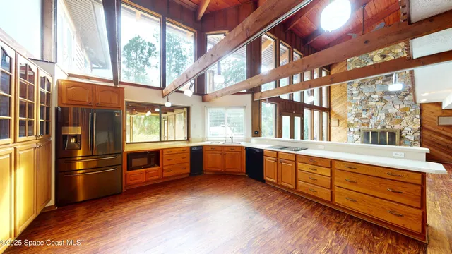 a view of a swimming pool with chairs