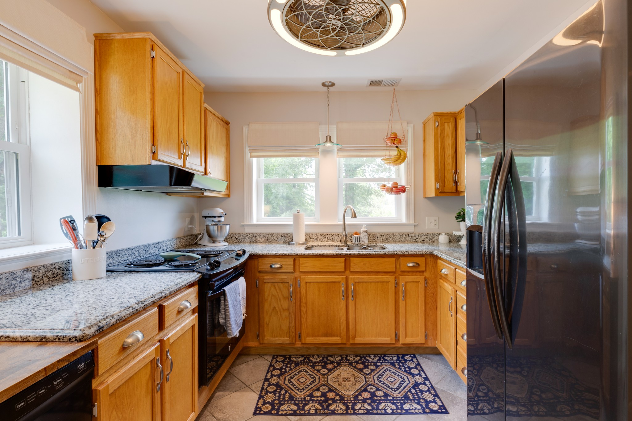 3020 Sylvia Road Dickson, TN 37055 - Photo 17 of 36 a kitchen with a sink stove and refrigerator