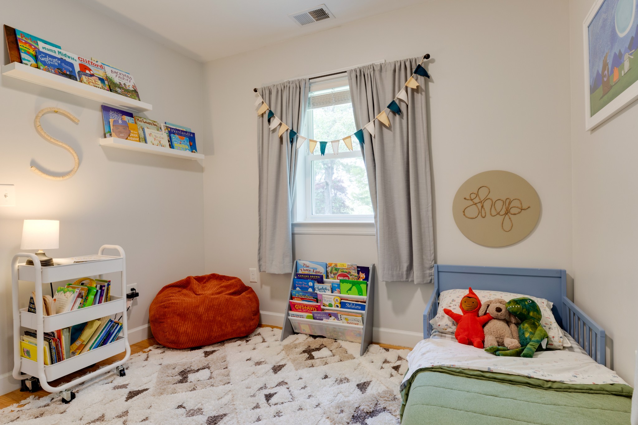 3020 Sylvia Road Dickson, TN 37055 - Photo 28 of 36 a bedroom with a bed and a window