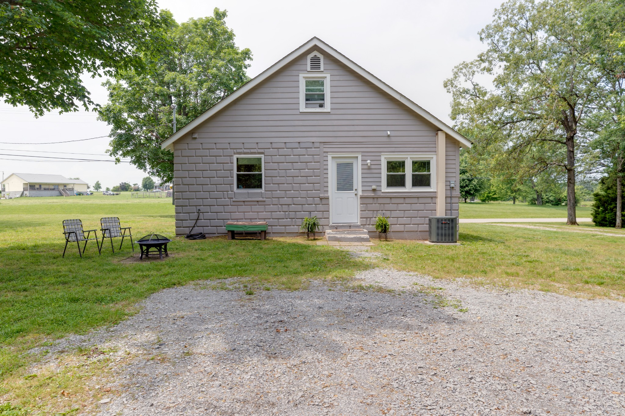 3020 Sylvia Road Dickson, TN 37055 - Photo 30 of 36 a view of a house with backyard and trees