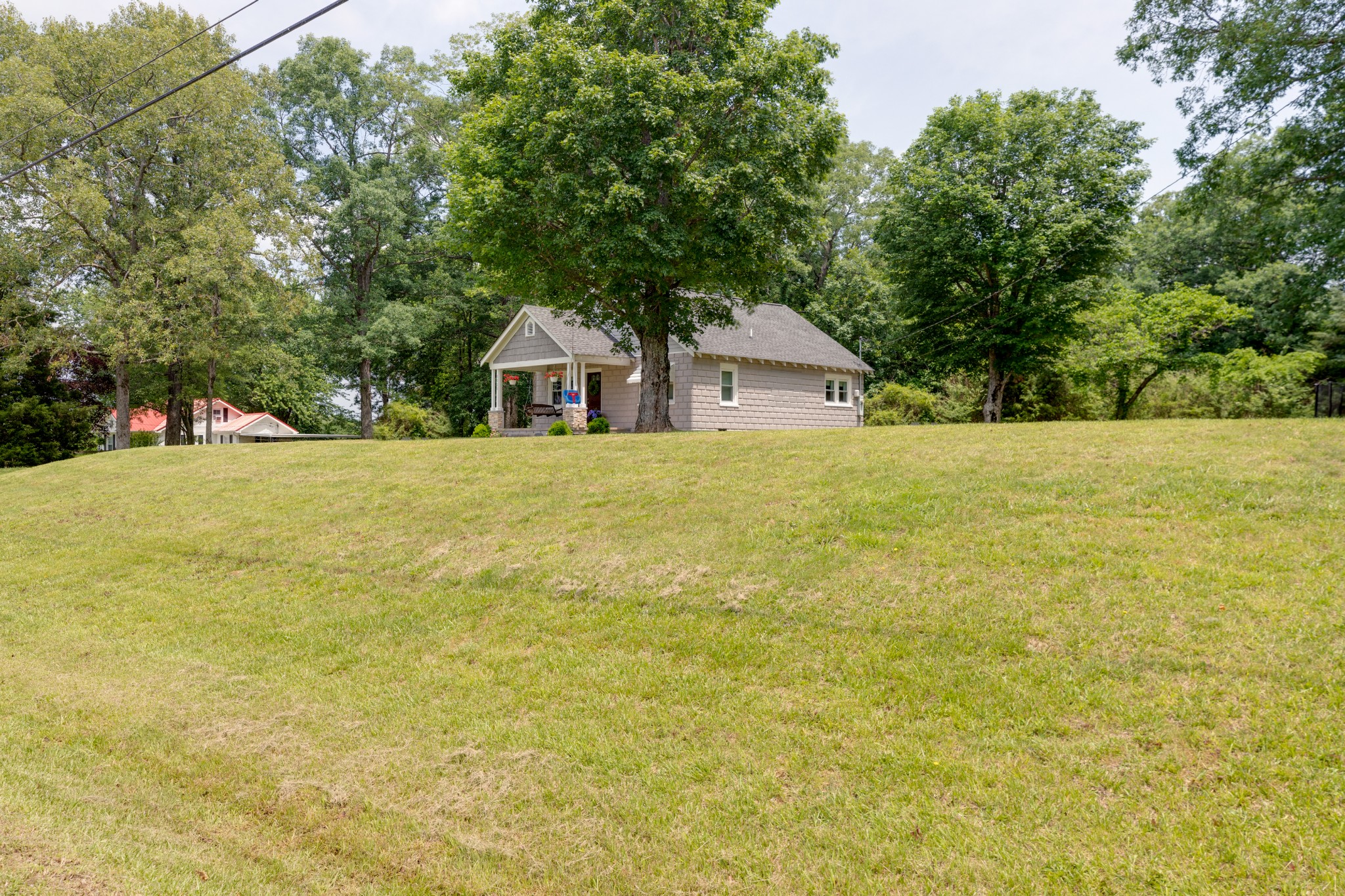 3020 Sylvia Road Dickson, TN 37055 - Photo 5 of 36 a view of an house with backyard and garden