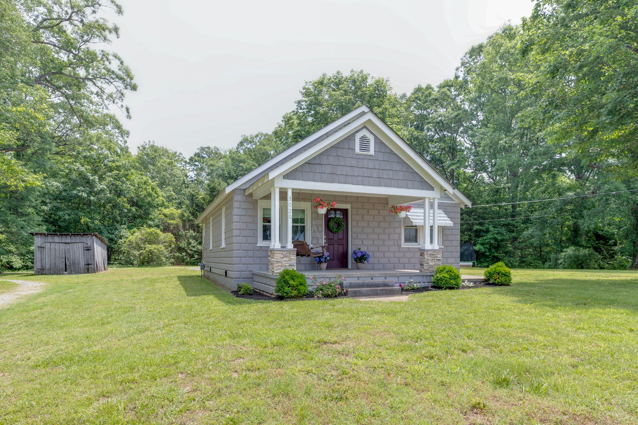 3020 Sylvia Road Dickson, TN 37055 - Photo 8 of 36 a front view of house with yard and green space