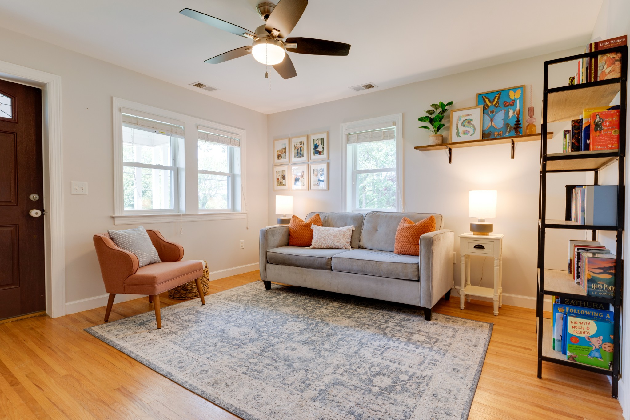 3020 Sylvia Road Dickson, TN 37055 - Photo 10 of 36 a living room with furniture a flat screen tv and a window
