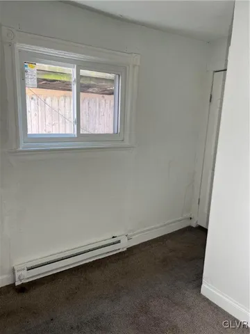 a kitchen with granite countertop a sink and a stove top oven