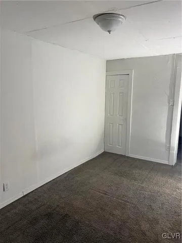 an empty room with a workbench