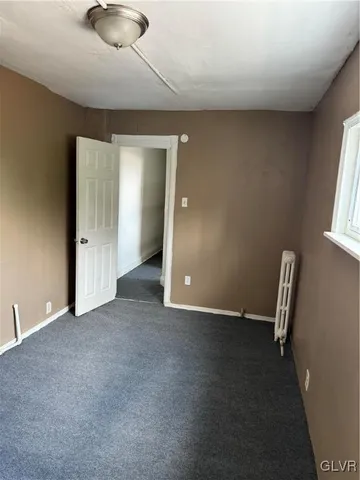 an empty room with a workbench