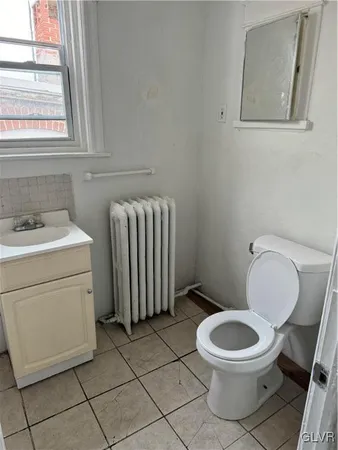 a view of a balcony with chairs