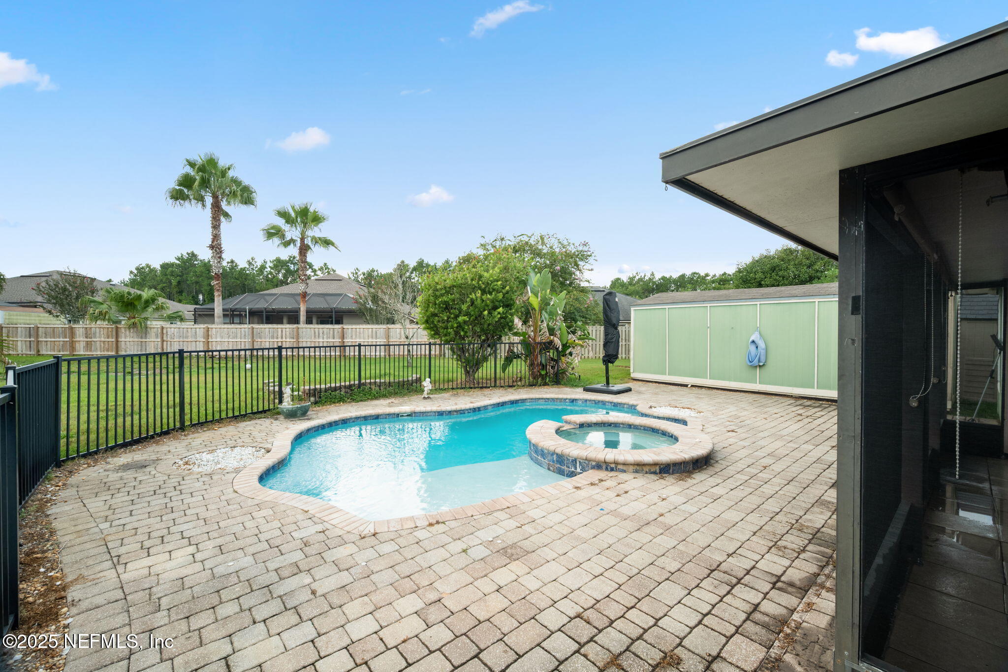 1827 Woodstone Way St. Augustine, FL 32092 - Photo 24 of 31 a view of a backyard with a tub
