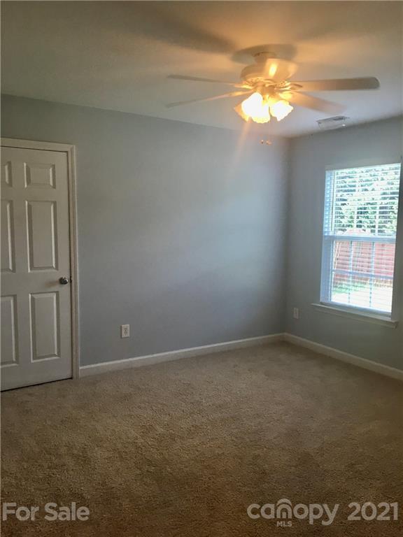 308 Covington Drive Inman, SC 29349 - Photo 14 of 22 an empty room with windows and closet
