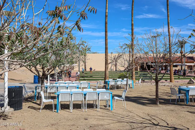 a view of a street with a building in the background