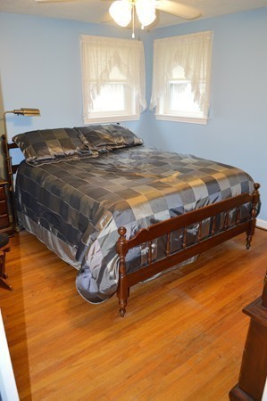175 Brewster Street Springfield, MA 01119 - Photo 11 of 16 a bedroom with a bed and window