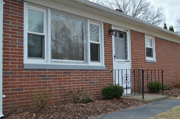 175 Brewster Street Springfield, MA 01119 - Photo 16 of 16 a view of brick house with a yard