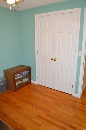 175 Brewster Street Springfield, MA 01119 - Photo 8 of 16 a bedroom with a bed