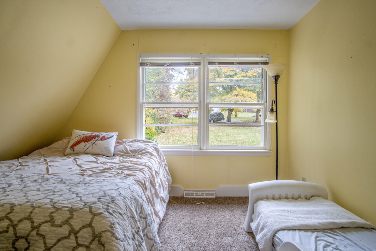 1910 Baintree Road Lake Summerset, IL 61019 - Photo 18 of 42 a bedroom with a bed and a window