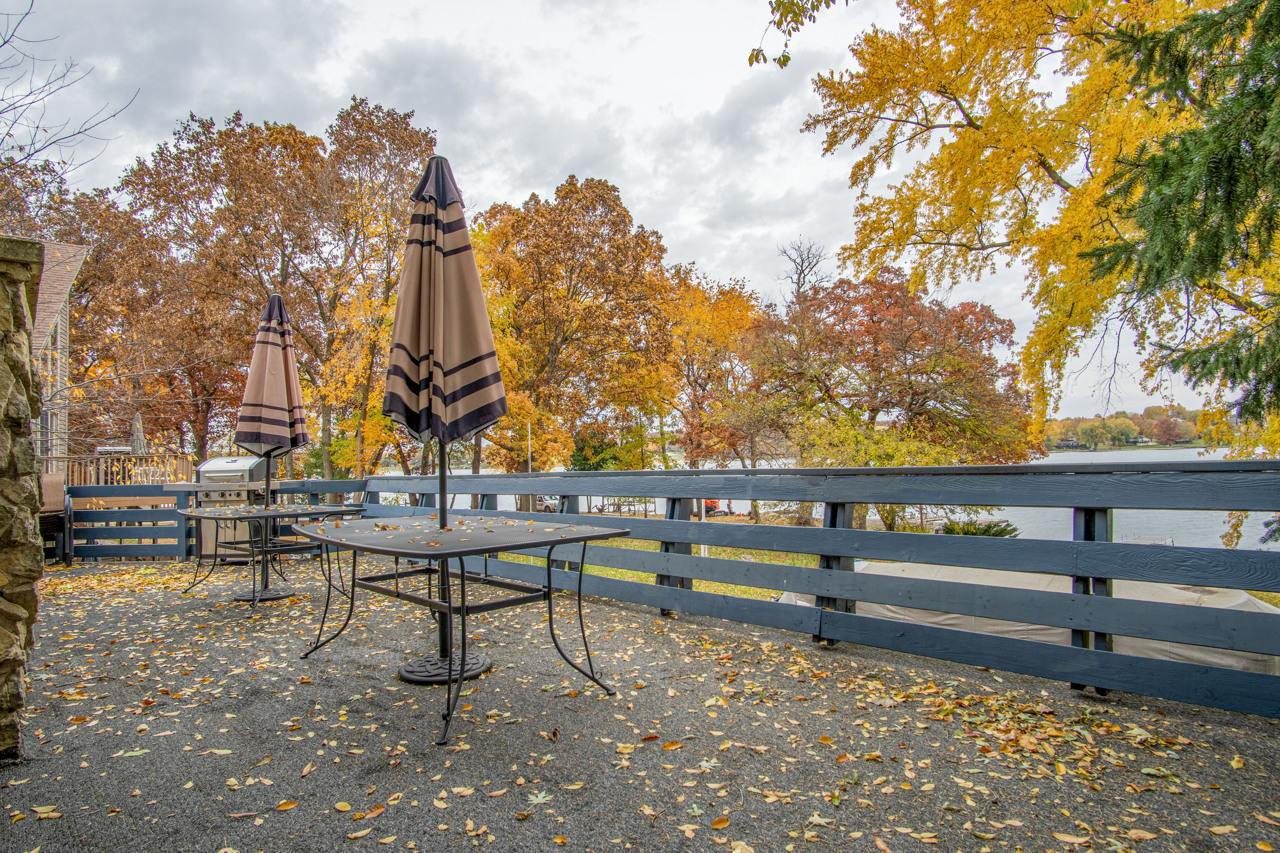 1910 Baintree Road Lake Summerset, IL 61019 - Photo 30 of 42 a view of outdoor space with lots of trees in the background