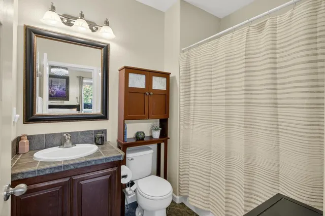 a view of entryway with wooden floor and stairs