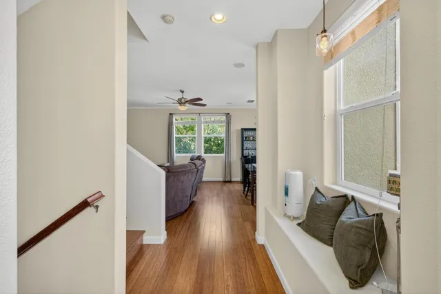 a view of a dining room with furniture window and wooden floor